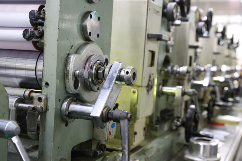 Close view of printing press rollers